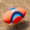imageChuckit Fumble Fetch Dog Football  Outdoor and Indoor Interactive Dog Toy with Grooved Design for Easy Pickup  Made from Durable Rubber  Floats in Water  Small  Orange and BlueOrangeBlue